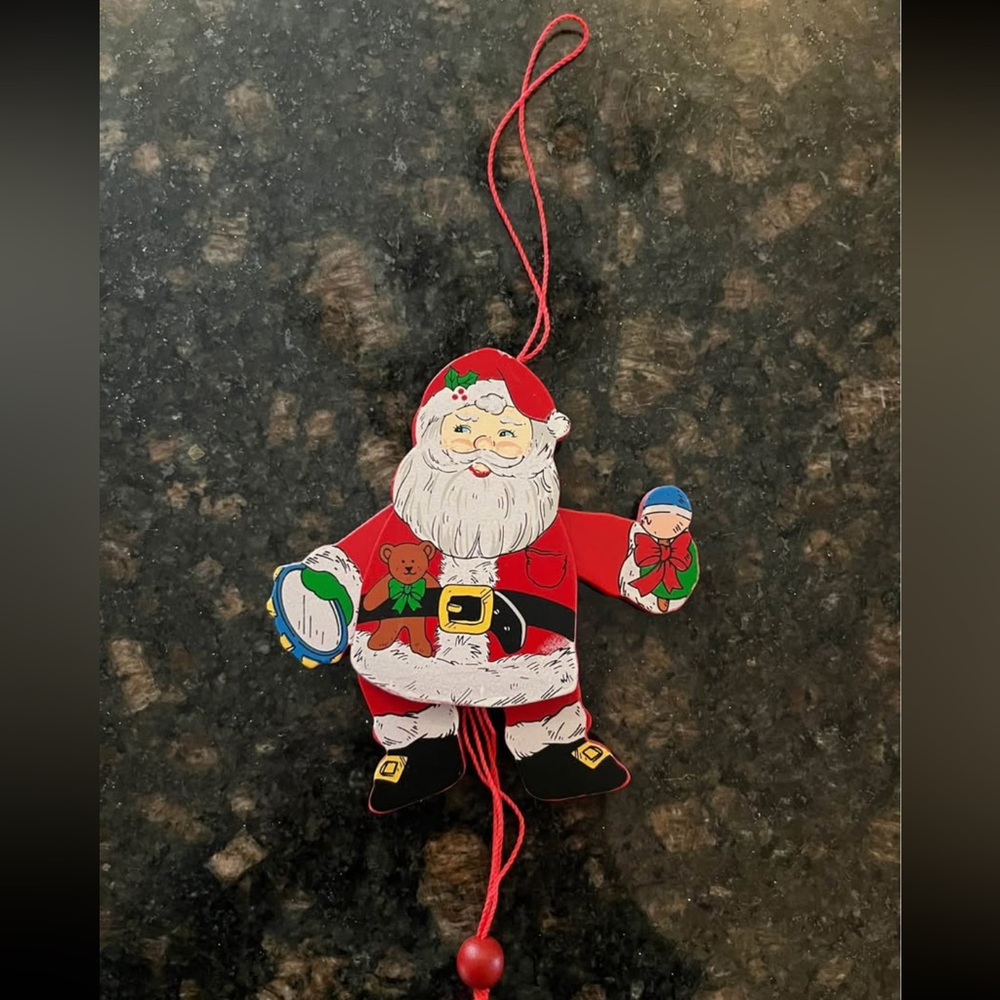Vintage 1990 NCE movable Santa magnet